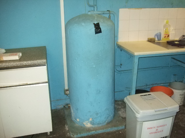 Asbestos tank, covered in insulation Gallery Image