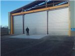 Happy customer with his industrial 14m door. Gallery Thumbnail