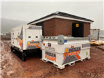 HVO Generator and extra fuel cube providing temporary power to a new housing development in Wales.  Gallery Thumbnail