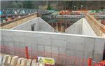 Pooley Bridge, England. 
Betts Construction formed the abutments within the cofferdams using the EFCO HAND-E-FORM system. These all-steel face sheets leave a single line. Gallery Thumbnail