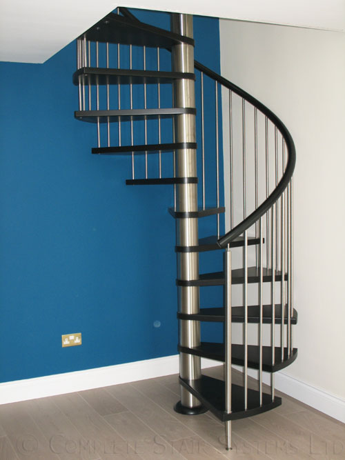 Bespoke Ash Timber Spiral with vertical steel spindle balustrade  Gallery Image