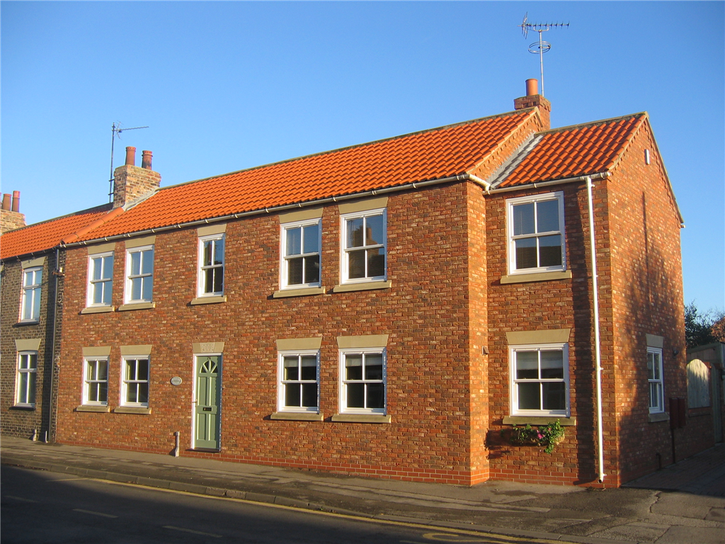 A lovely rural village infill dwelling, constructed in York Handmade brick, with timber sash windows! Gallery Image