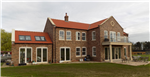 A new country residence in the Yorkshire Wolds, incorporating Passive Solar Design Principles coupled to a ground source heat pump and HVR giving a Code 5 sustainable home with very low running costs! Gallery Thumbnail